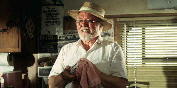 Richard Attenborough cleaning a glass with a rag as John Hammond in Jurassic Park