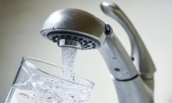 Water filling a glass