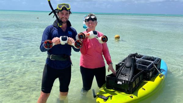 Professor Maria Byrne with PhD student Matt Clements on a crown-of-thorns starfish survey.